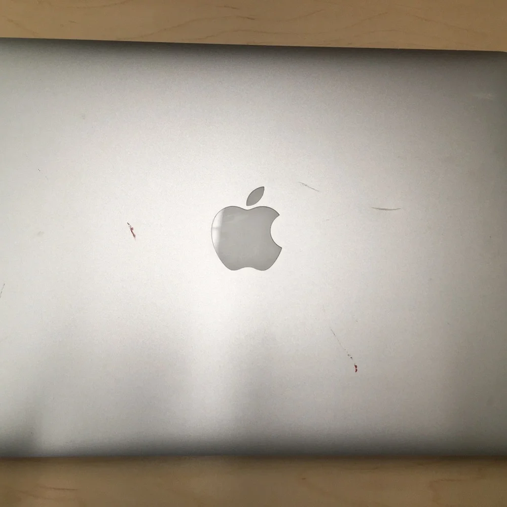 Mac air 2017 13 inch MacOS Scratches . Small dent $270